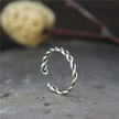 DIAMOURA TWISTED RING